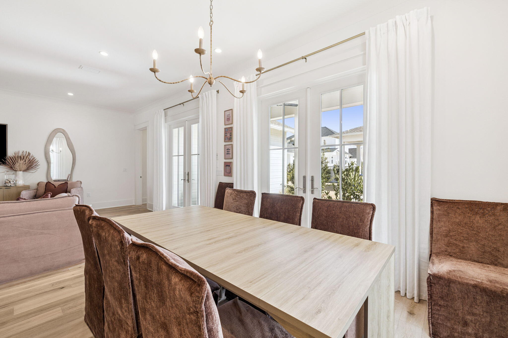 41 West Pollard Cove Inlet Beach Inlet Beach, FL 32461 - Photo 29 of 54 a large white kitchen with a table and chairs
