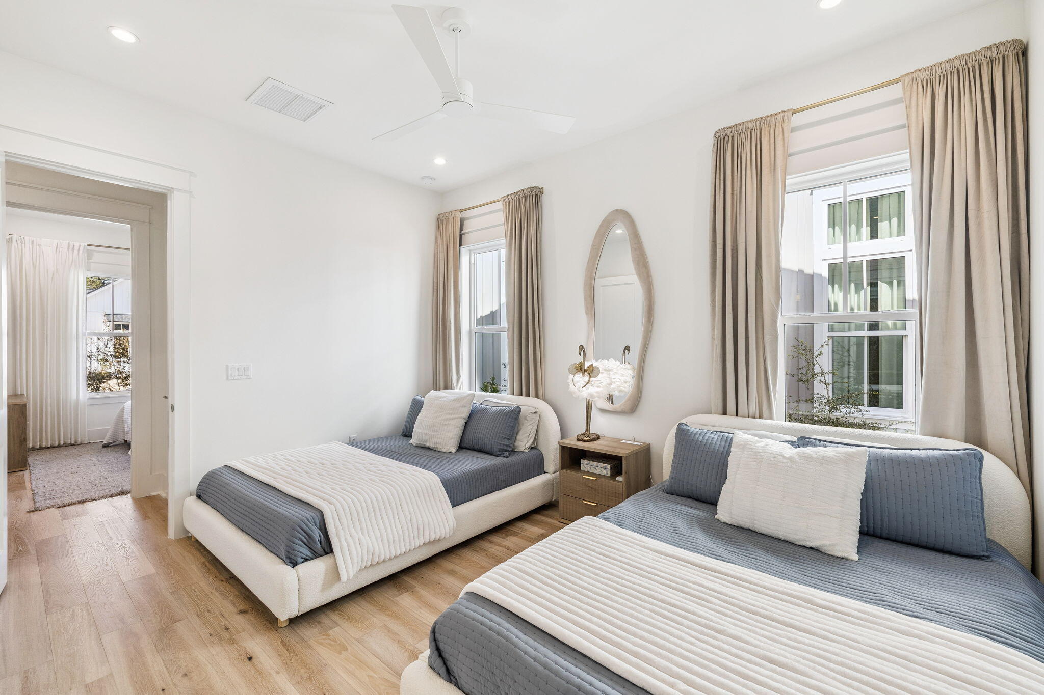 41 West Pollard Cove Inlet Beach Inlet Beach, FL 32461 - Photo 37 of 54 a bedroom with two beds and a large window