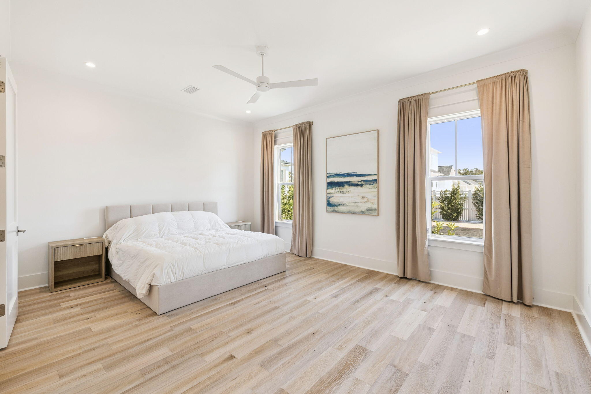 41 West Pollard Cove Inlet Beach Inlet Beach, FL 32461 - Photo 39 of 54 a bedroom with a large bed a chandelier and a window
