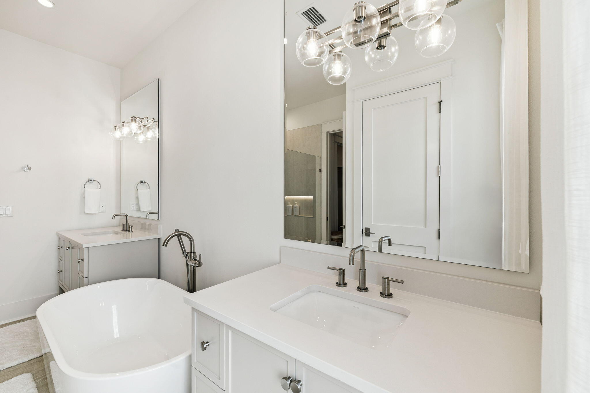 41 West Pollard Cove Inlet Beach Inlet Beach, FL 32461 - Photo 42 of 54 a bathroom with a double vanity sink mirror and bathtub