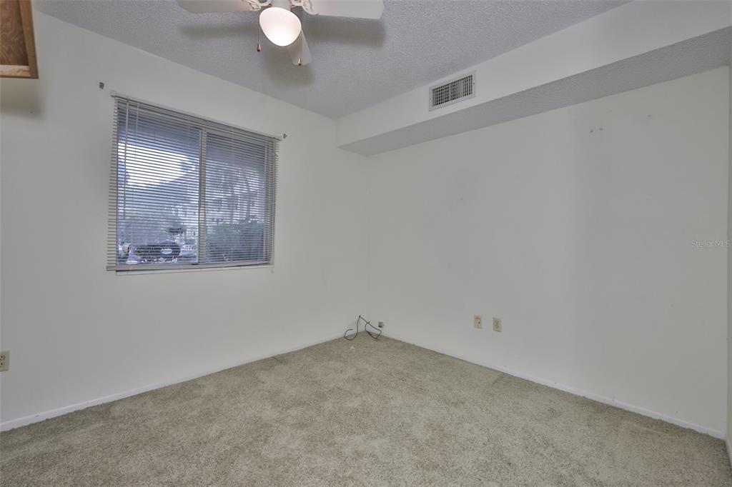 801 83rd Avenue North, Unit 118 St. Petersburg, FL 33702 - Photo 21 of 37 an empty room with a window