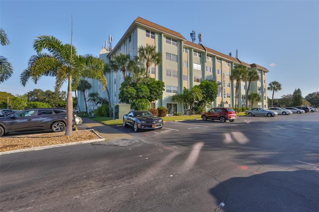 801 83rd Avenue North, Unit 118 St. Petersburg, FL 33702 - Photo 30 of 37 a view of a street with cars