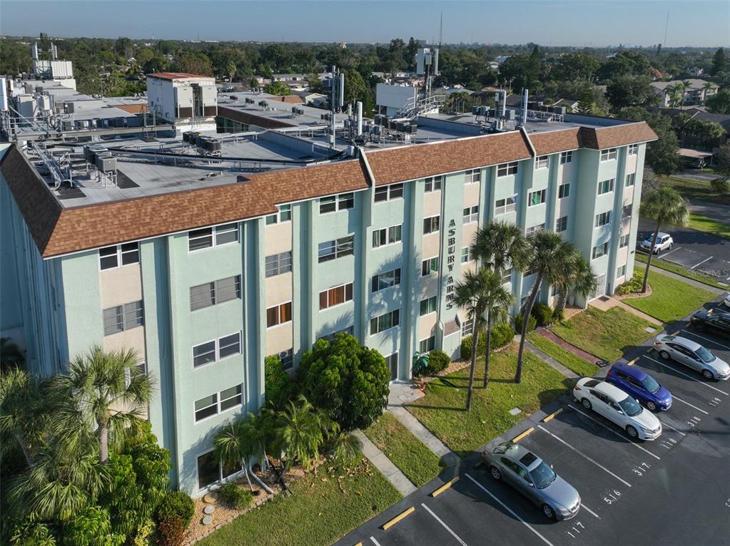 801 83rd Avenue North, Unit 118 St. Petersburg, FL 33702 - Photo 31 of 37 a view of a swimming pool with a patio