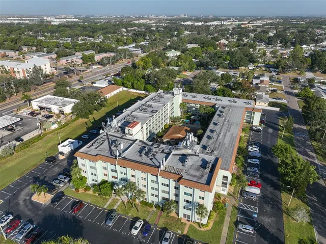 an aerial view of a city with lots of residential buildings