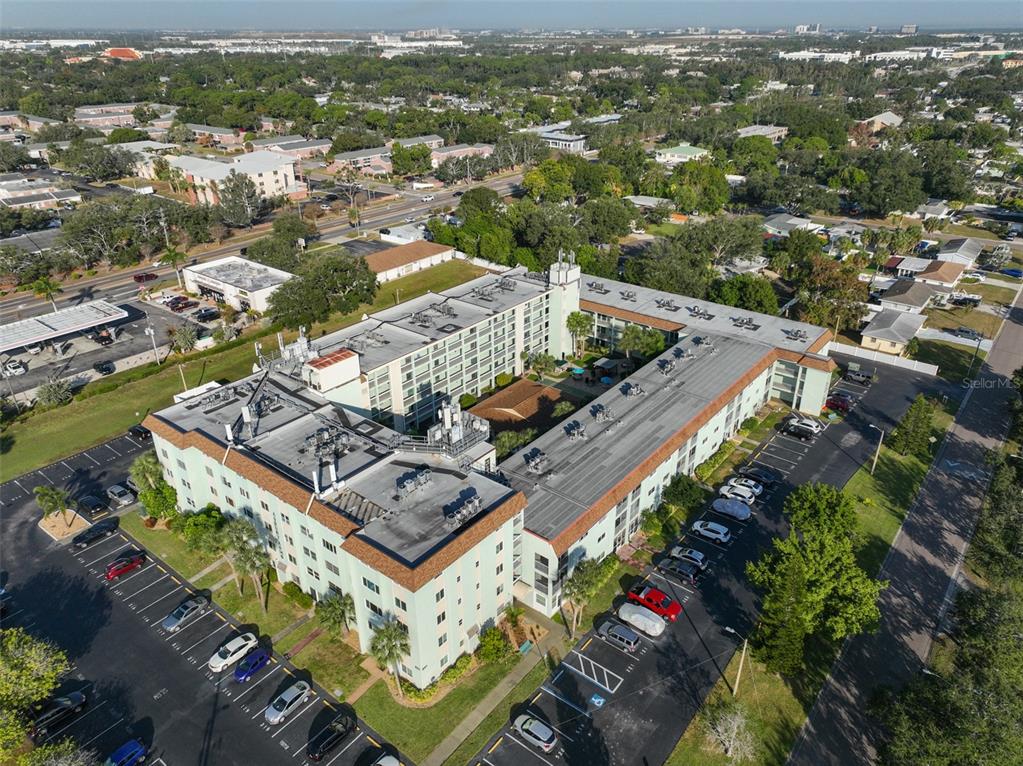 801 83rd Avenue North, Unit 118 St. Petersburg, FL 33702 - Photo 34 of 37 an aerial view of a city with lots of residential buildings