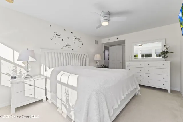 a bedroom with a bed and a with furniture