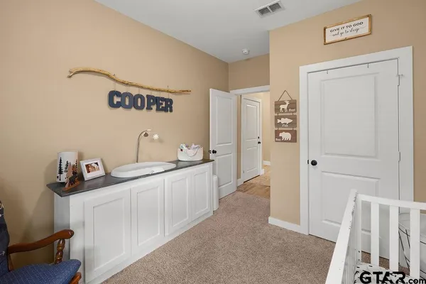a hallway with cabinets