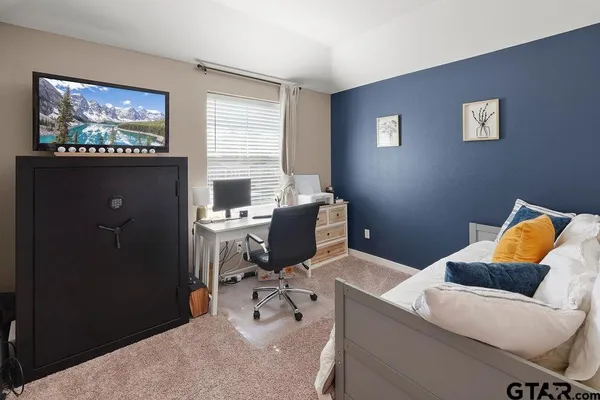 a workspace with furniture and window