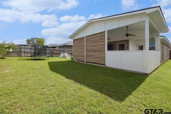 a view of a backyard with a garden