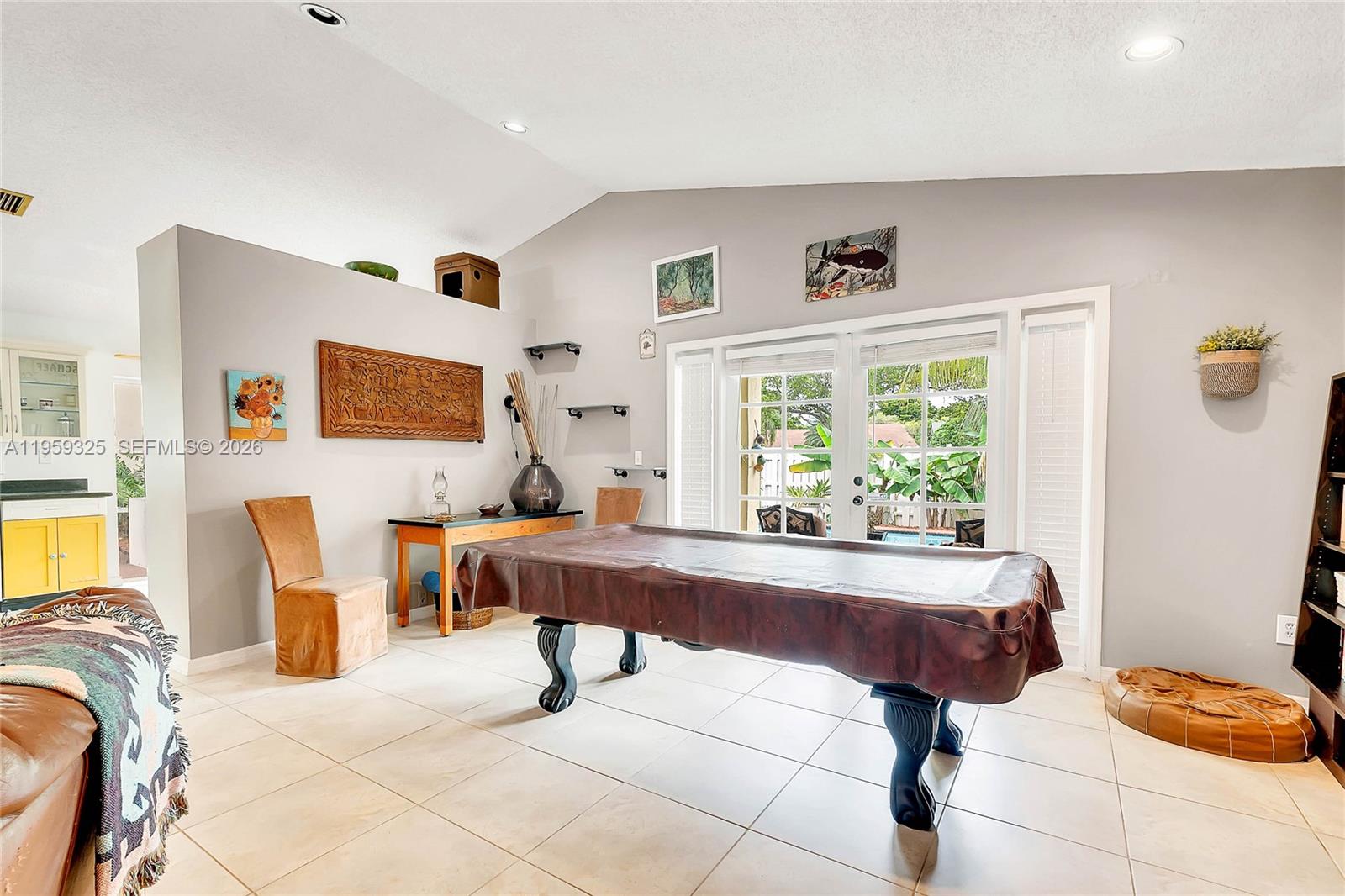 4534 Southwest 147th Court Miami, FL 33185 - Photo 11 of 22 a living room with furniture a rug and a large window