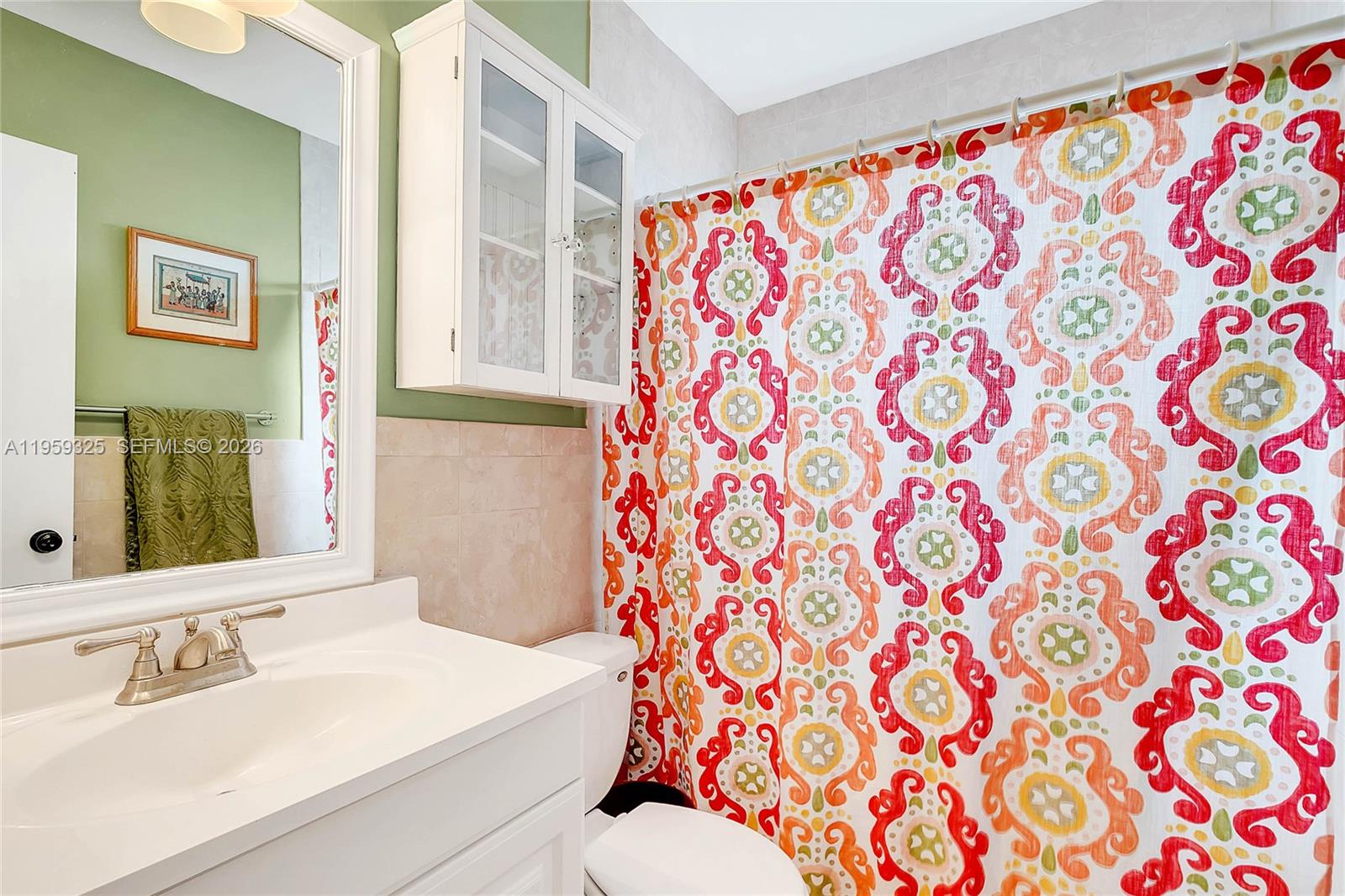 4534 Southwest 147th Court Miami, FL 33185 - Photo 9 of 22 a bathroom with a sink and a mirror