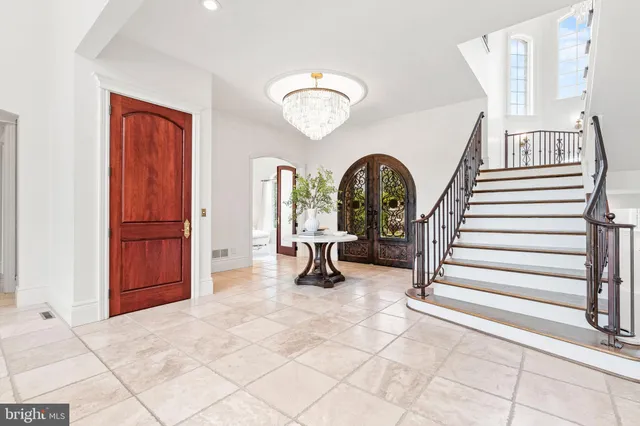 a living room with furniture a fireplace and a fireplace
