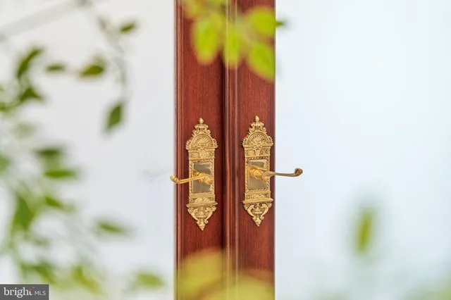 a front view of a house with a large window
