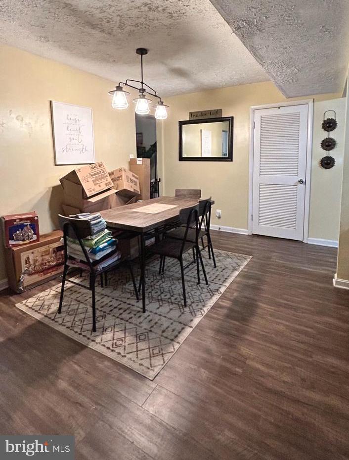 17520 Hoskinson Road Poolesville, MD 20837 - Photo 9 of 13 a view of a dining room with furniture and wooden floor