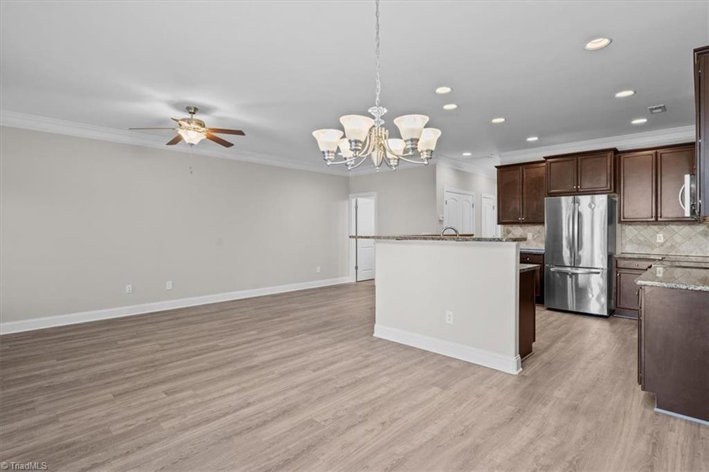 4323 Holstein Drive High Point, NC 27265 - Photo 9 of 24 Dining area looking towards living room and kitchen