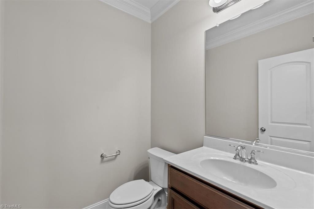 4323 Holstein Drive High Point, NC 27265 - Photo 10 of 24 Downstairs half bath