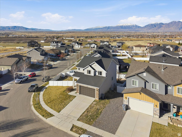 1218 Moonlight Drive Elk Ridge, UT 84651 - Photo 41 of 44 Aerial perspective of suburban area featuring a mountainous background