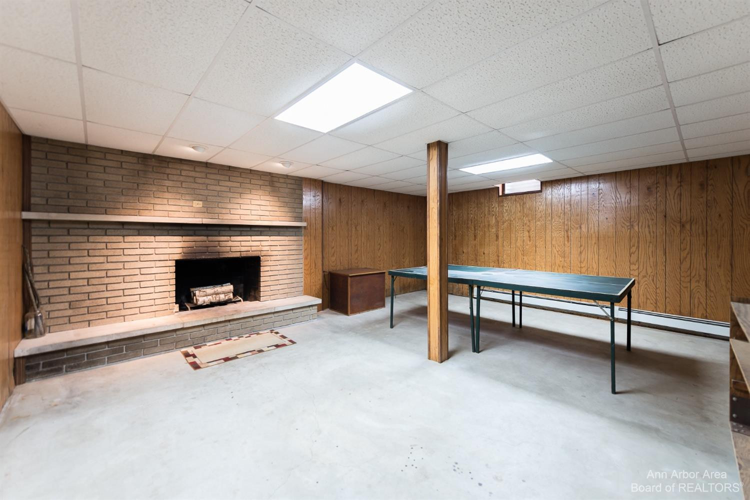 11081 Dexter-Chelsea Road Dexter, MI 48130 - Photo 24 of 36 Rec room in the basement.