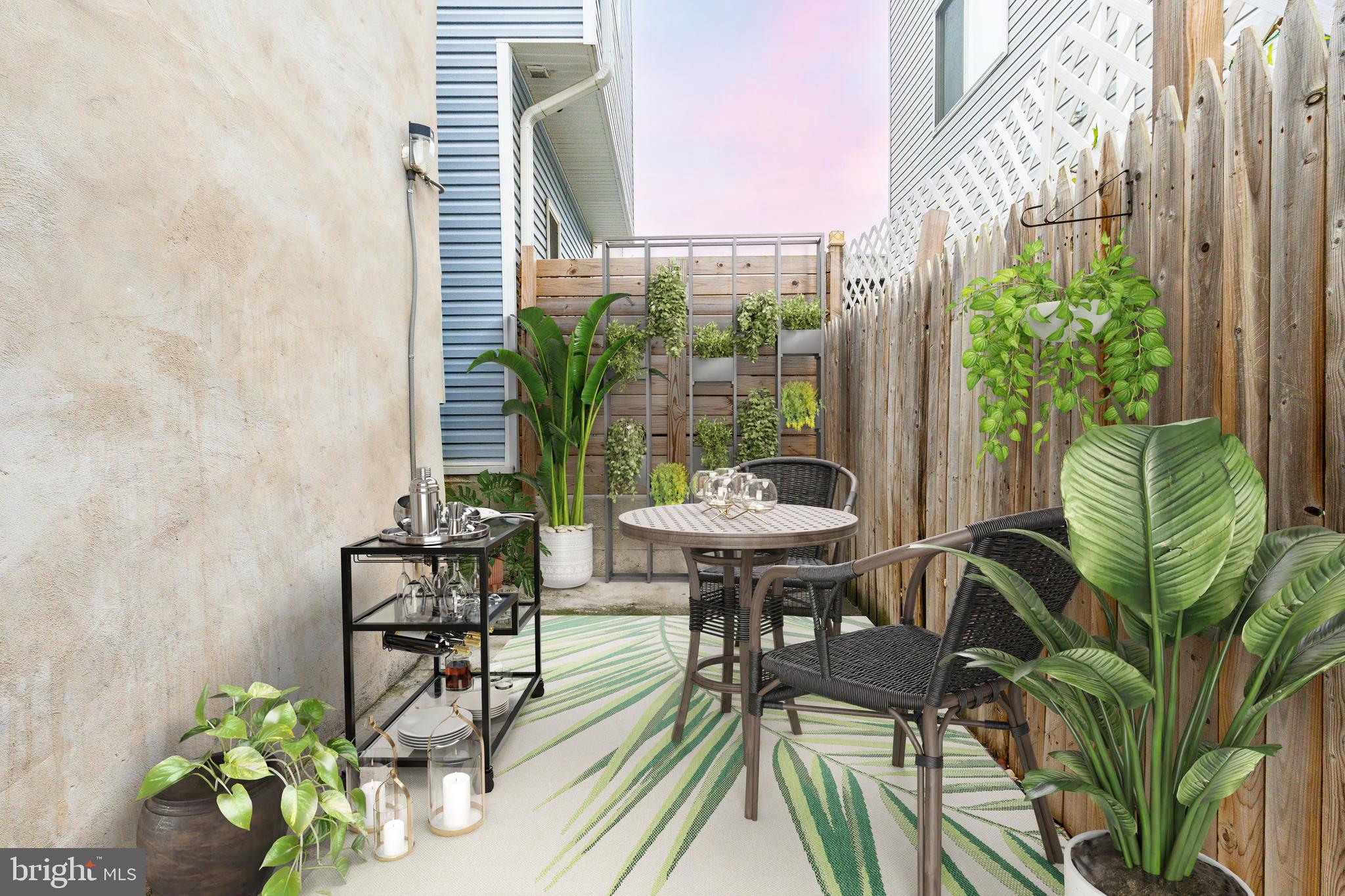 2726 Edgemont Street Philadelphia, PA 19134 - Photo 15 of 32 a view of a table and chairs in patio