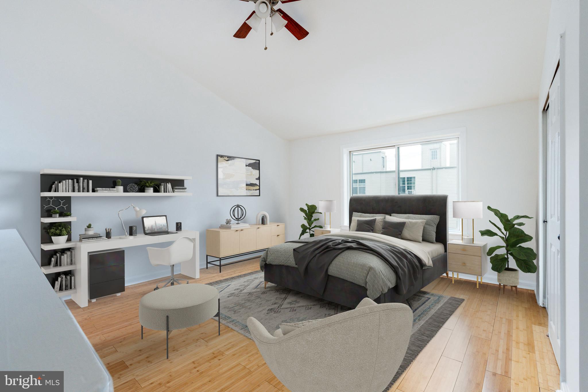 2726 Edgemont Street Philadelphia, PA 19134 - Photo 16 of 32 a bedroom with furniture and a wooden floor