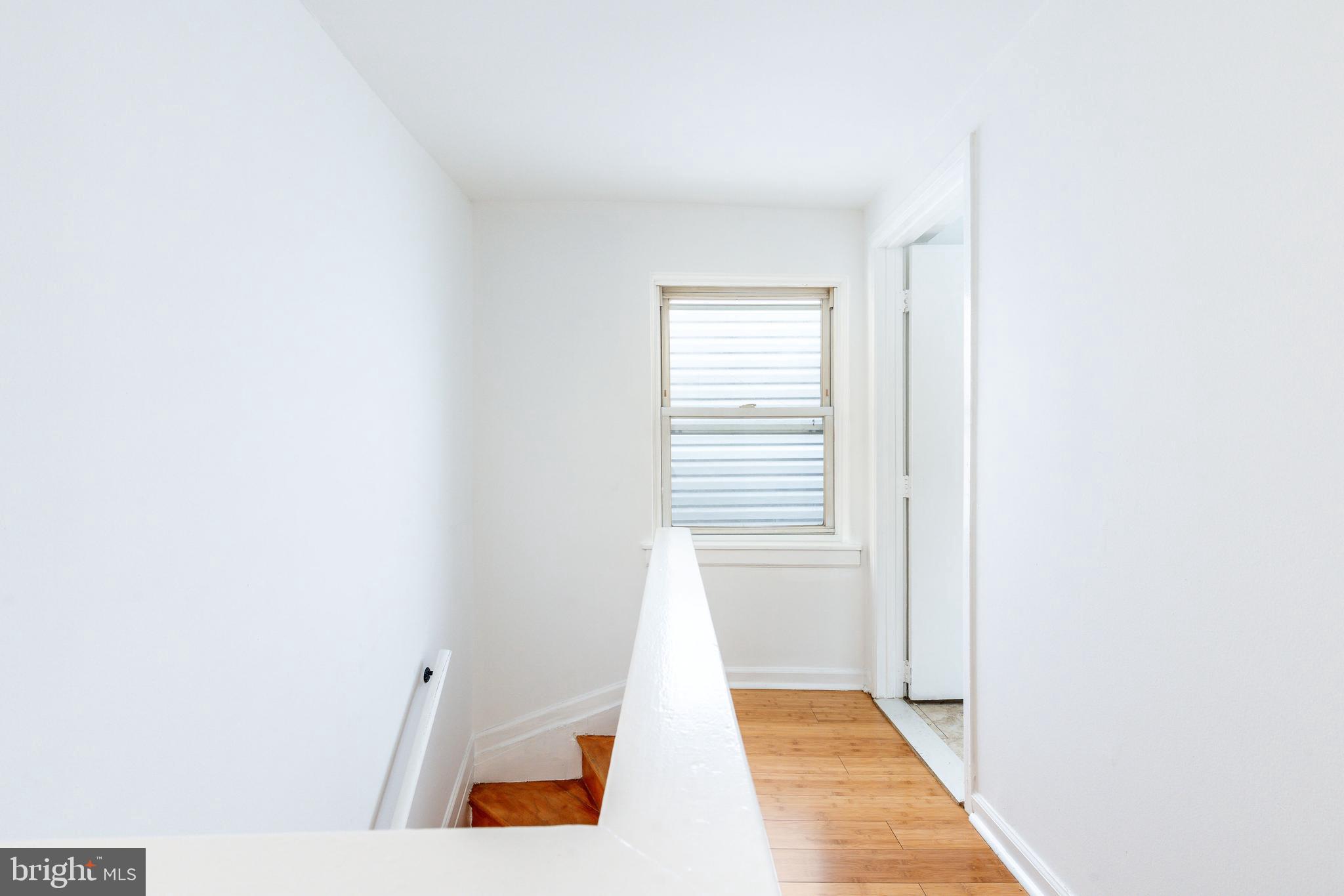 2726 Edgemont Street Philadelphia, PA 19134 - Photo 20 of 32 a view of an empty room with a window