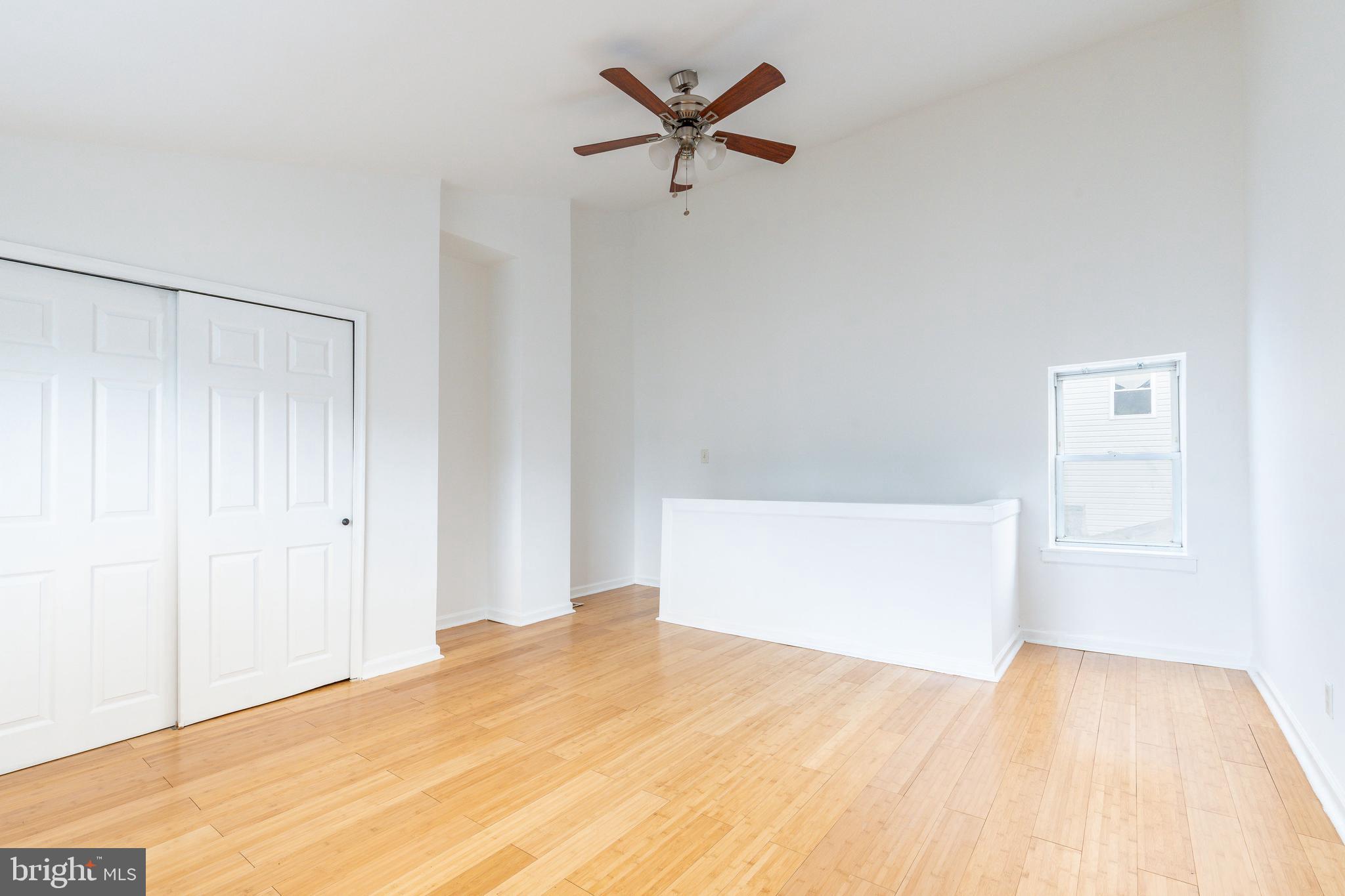 2726 Edgemont Street Philadelphia, PA 19134 - Photo 23 of 32 a view of empty room with wooden floor