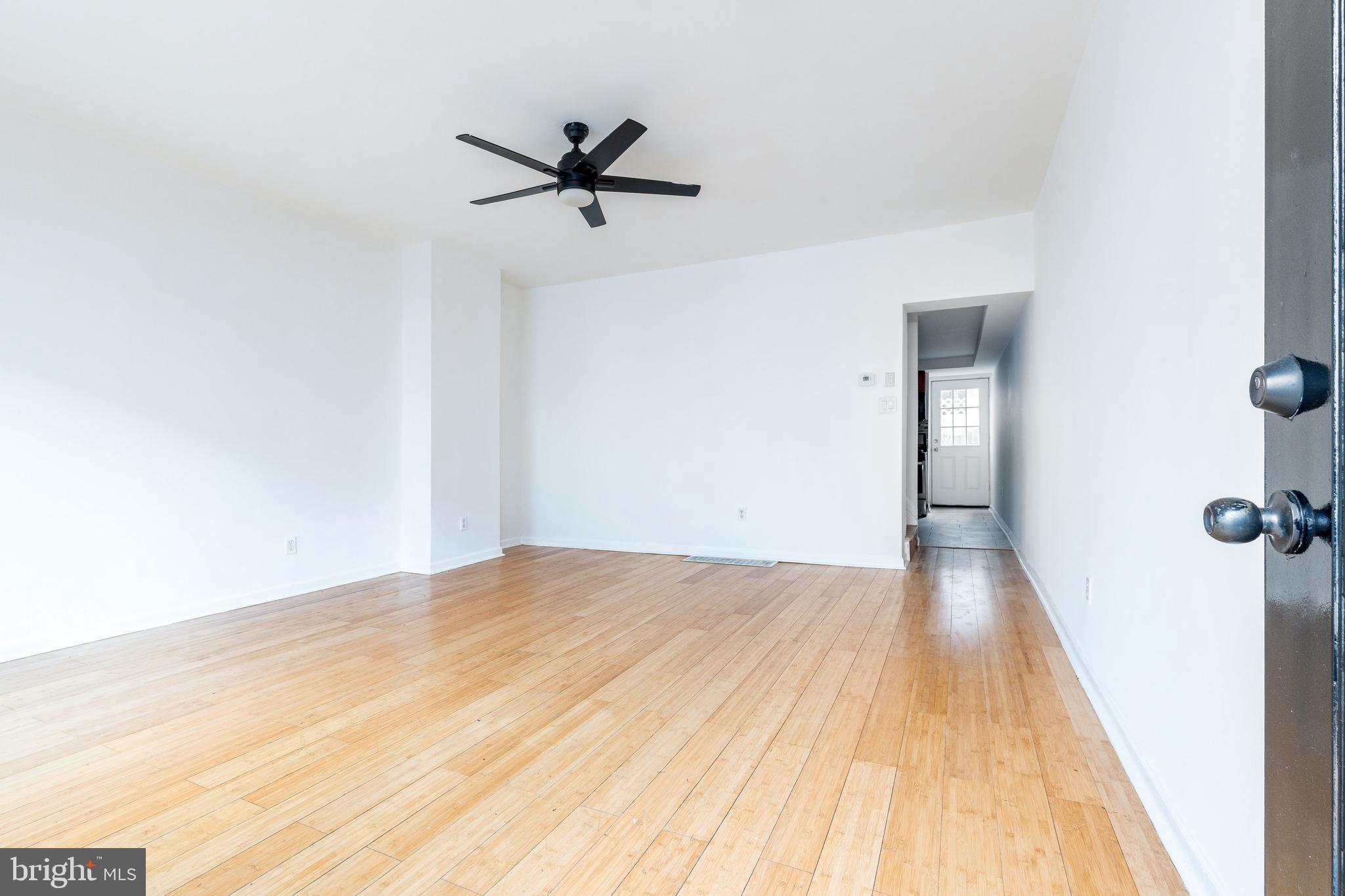 2726 Edgemont Street Philadelphia, PA 19134 - Photo 5 of 32 a view of a room with a wooden floor