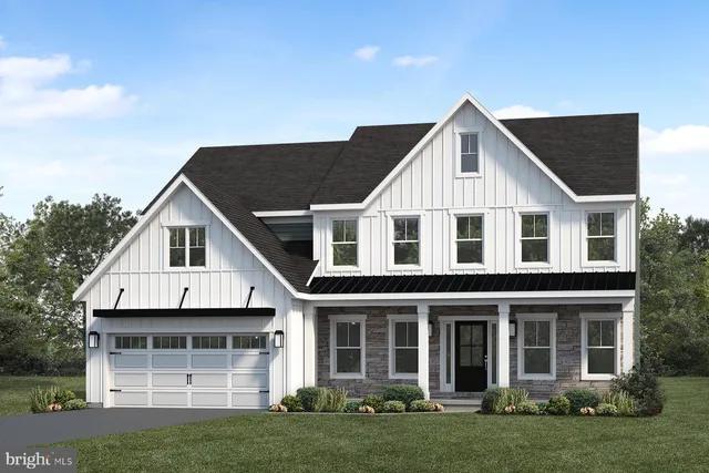 a view of house with yard