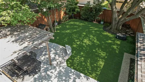 a backyard of a house with lots of green space