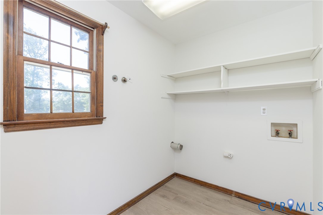 617 Rebel Ridge Road Colonial Heights, VA 23834 - Photo 32 of 49 an empty room with a window