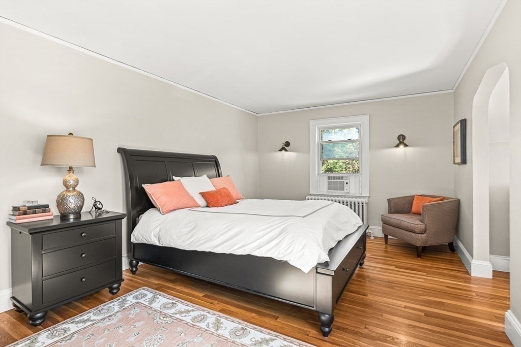 15 White Oak Road Boston, MA 02132 - Photo 13 of 24 a bedroom with bed and window
