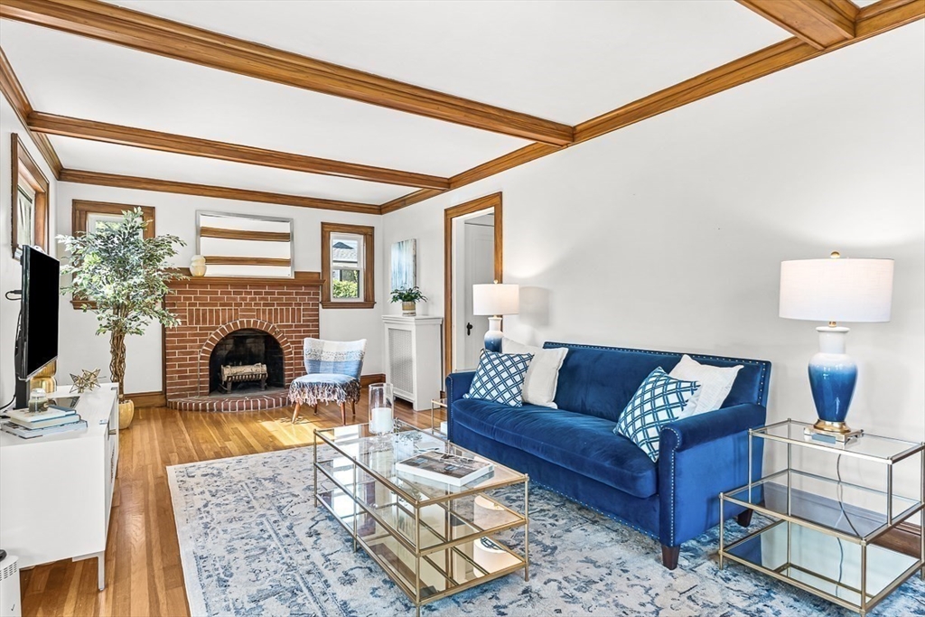 15 White Oak Road Boston, MA 02132 - Photo 3 of 24 a living room with furniture and a fireplace