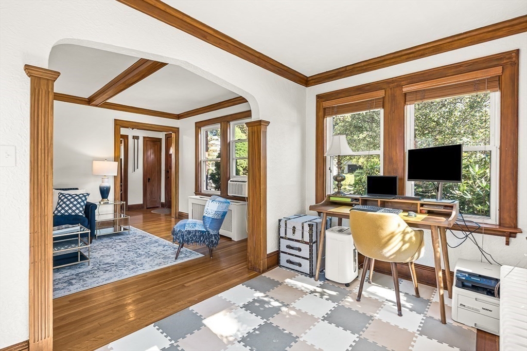 15 White Oak Road Boston, MA 02132 - Photo 7 of 24 a view of a livingroom with workspace and a window