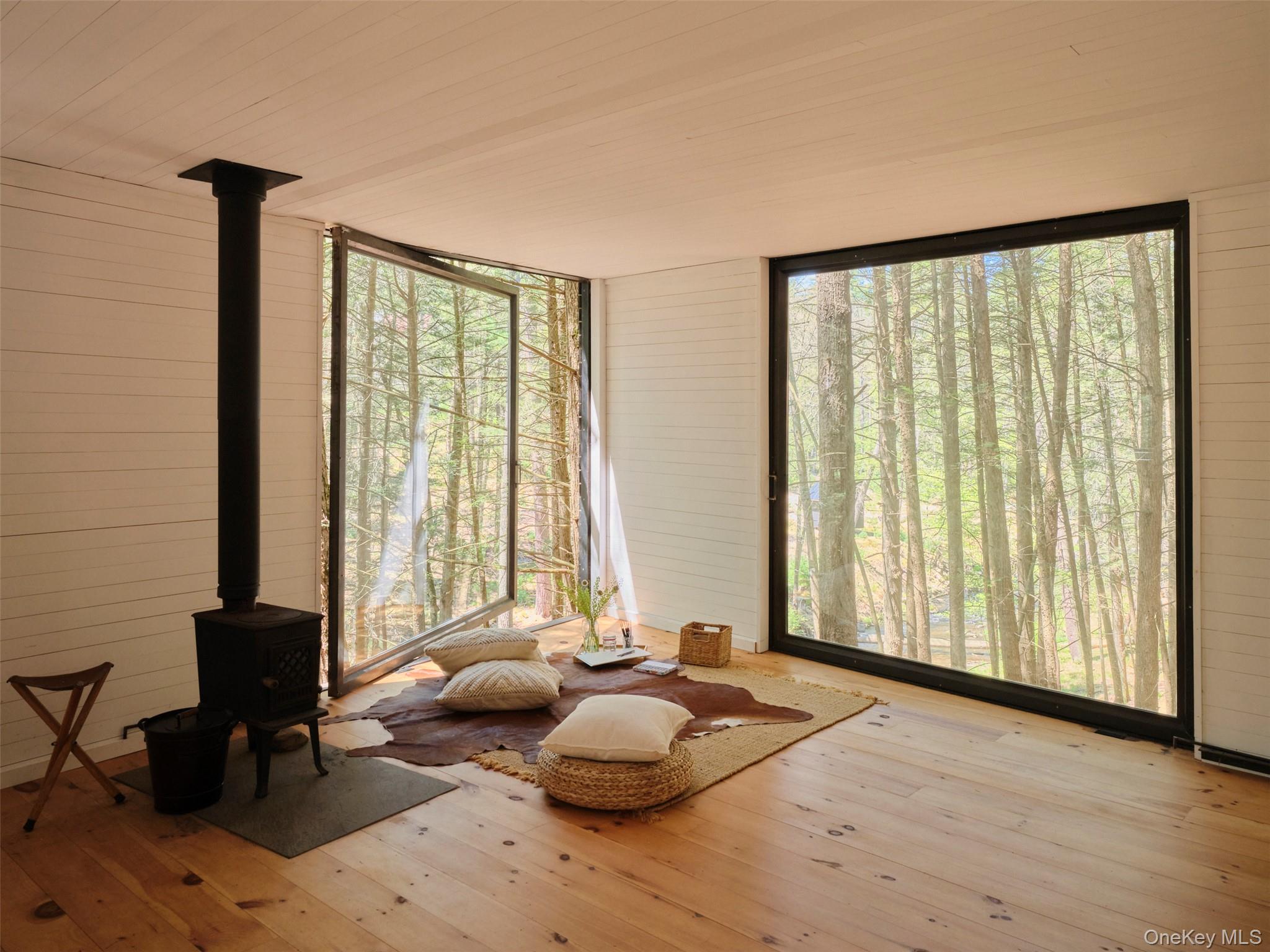 55 Woods Road Barryville, NY 12719 - Photo 8 of 50 a bedroom with furniture and a window