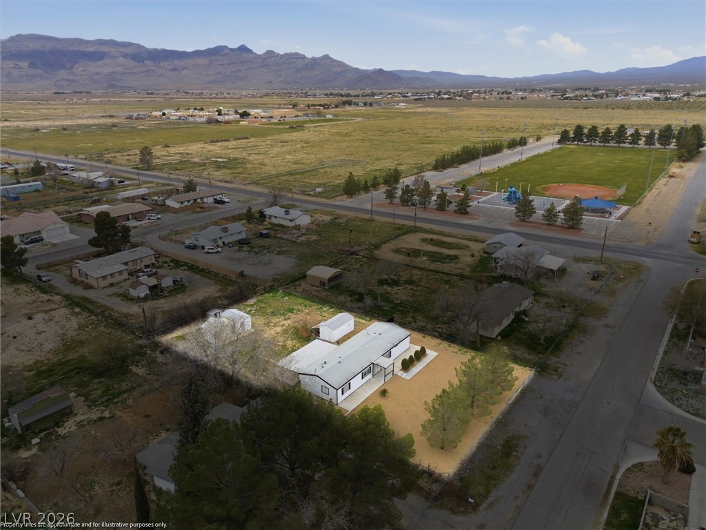 3940 Point Drive Pahrump, NV 89060 - Photo 34 of 35 Overlooking expansive views, a community park with a baseball field and playground.