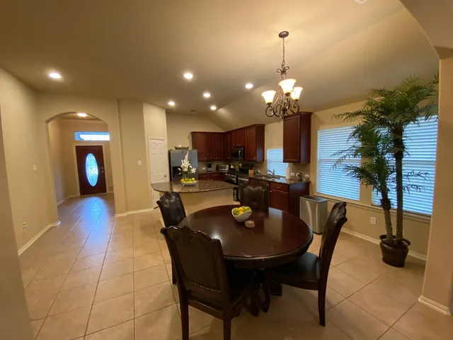 a view of a dining room with furniture