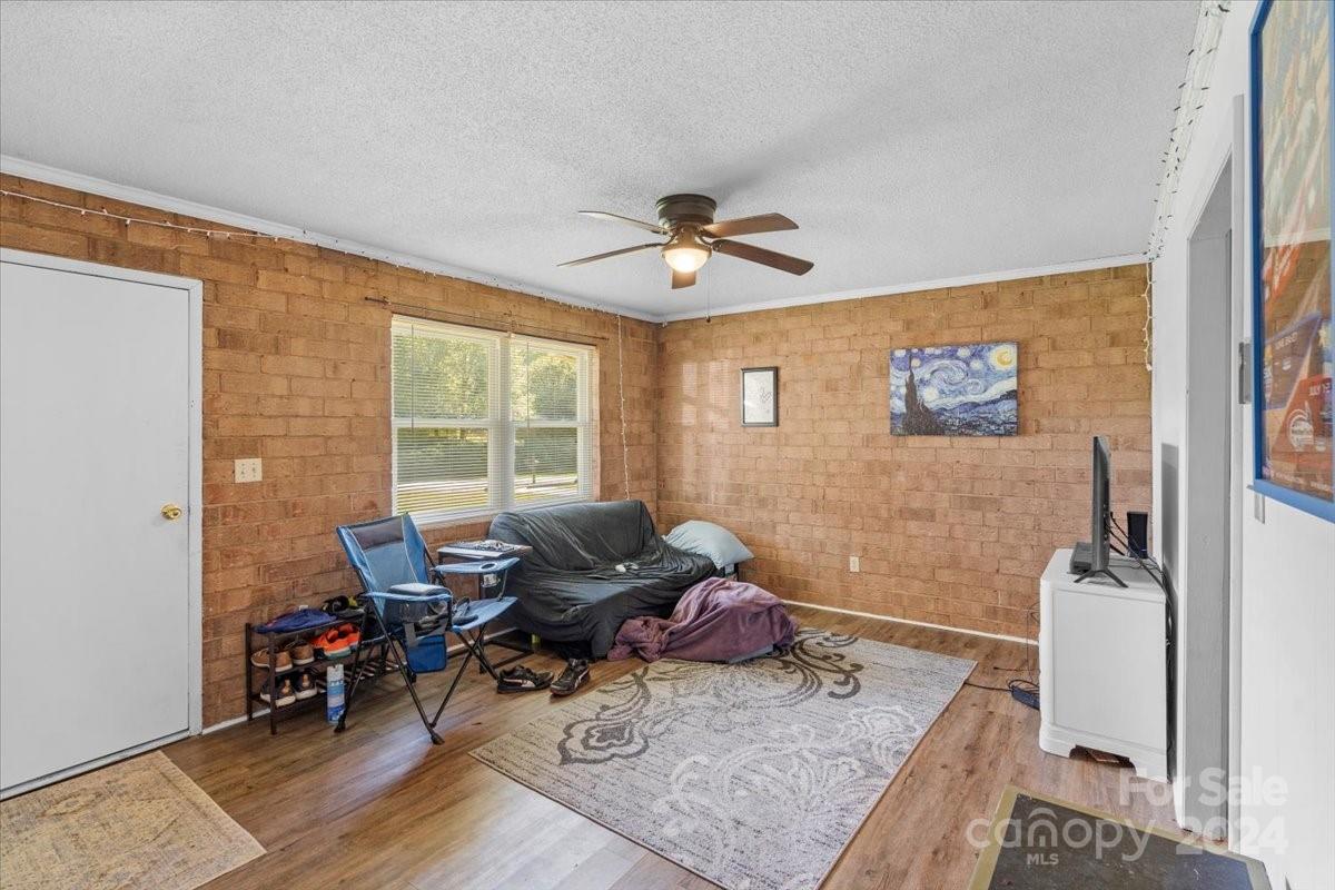 4251 Kiser Island Road Terrell, NC 28682 - Photo 11 of 30 a living room with furniture and wooden floor