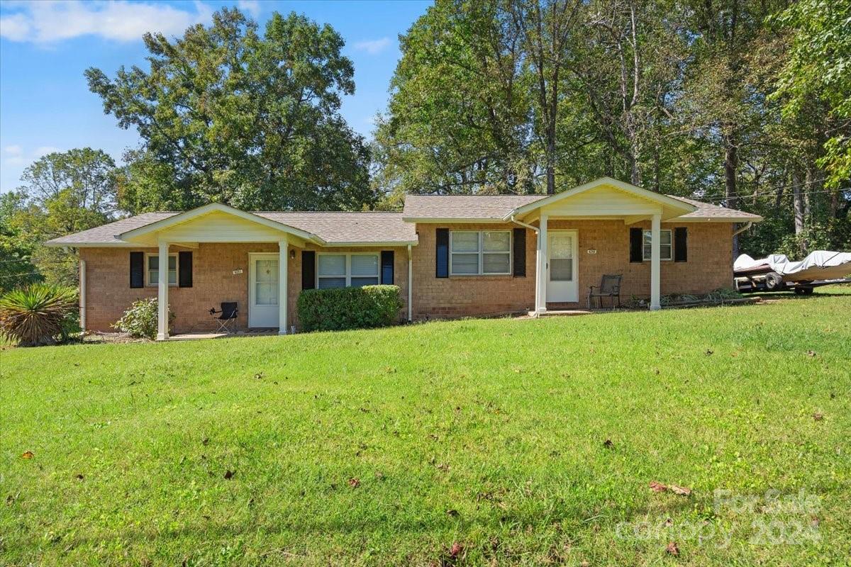 4251 Kiser Island Road Terrell, NC 28682 - Photo 6 of 30 a front view of a house with a garden