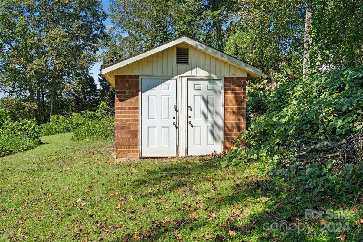 4251 Kiser Island Road Terrell, NC 28682 - Photo 8 of 30 a view of a small house with a small yard