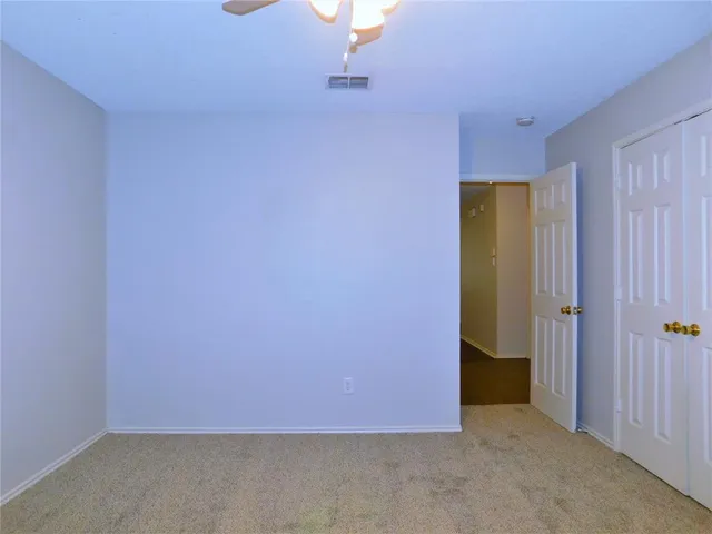 an empty room with closet