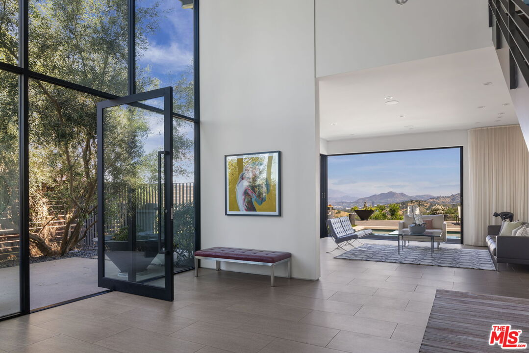 3337 Beverly Ranch Road Beverly Hills, CA 90210 - Photo 5 of 36 a view of a entryway door of the room