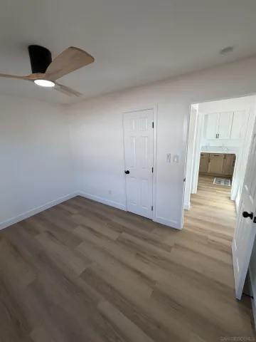 a view of a livingroom with wooden floor