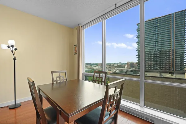 a view of a dining room with furniture window and outside view