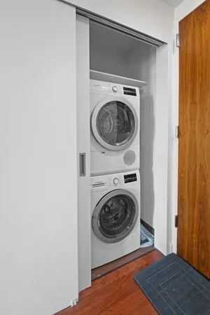 a utility room with dryer and washer