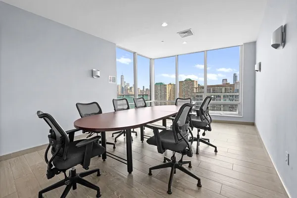 a kitchen with cabinets and window