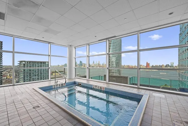 a view of a balcony with city view
