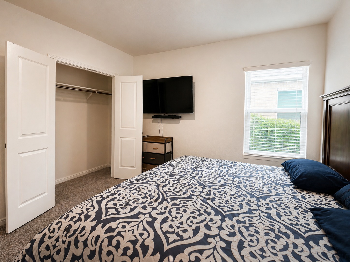 108 Blue Blaze Trail Georgetown, TX 78628 - Photo 17 of 26 a bedroom with a bed and a television