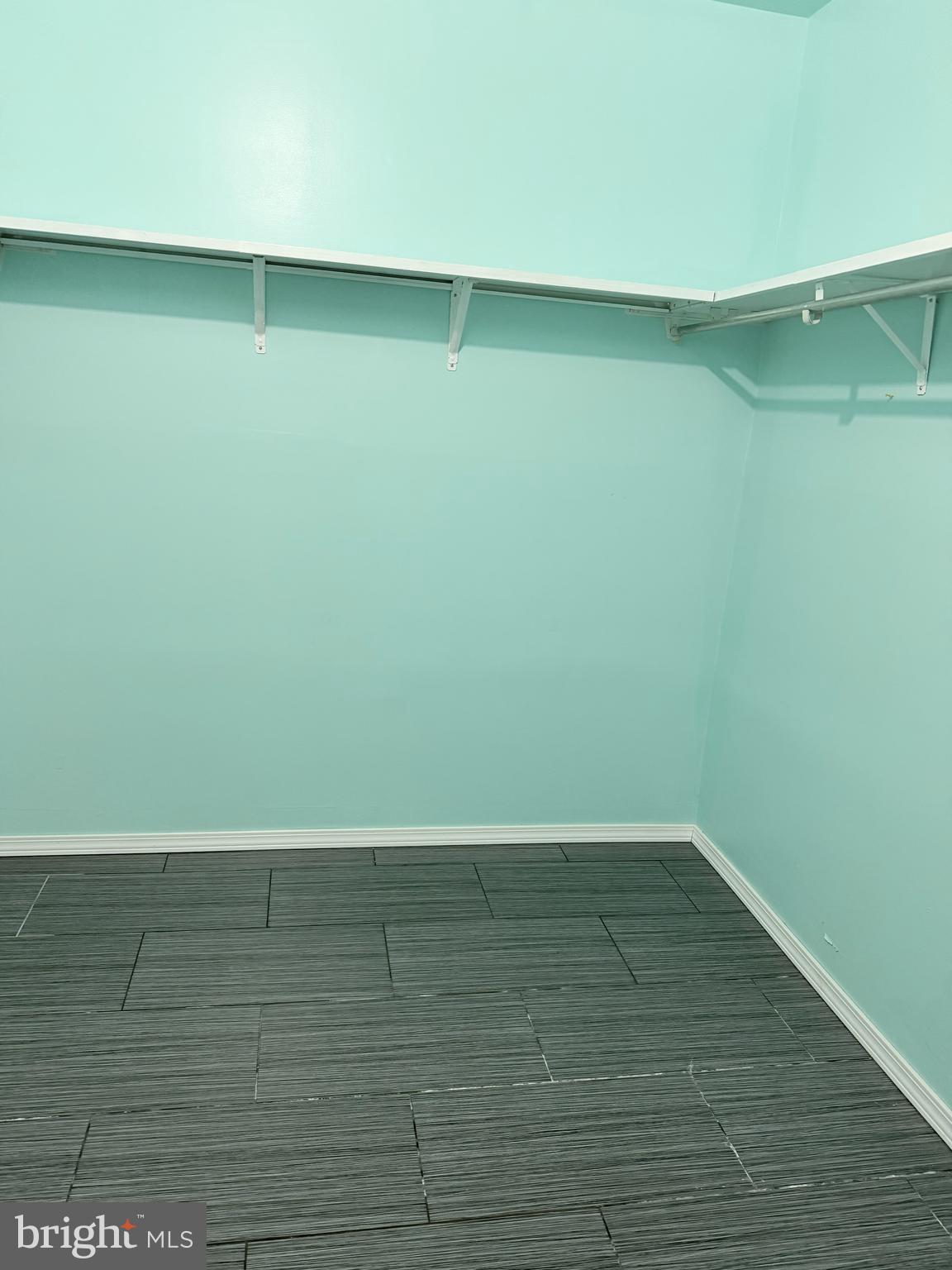 11206 Cherry Hill Road, Unit 92 Beltsville, MD 20705 - Photo 11 of 18 a view of a room with wooden floor