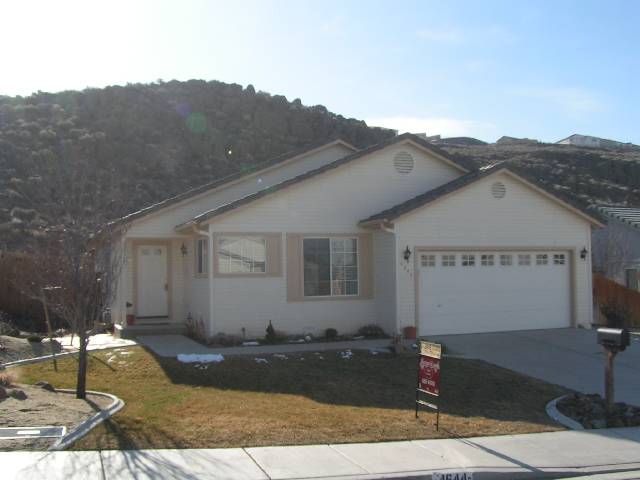 4644 Goodwin Road Sparks, NV 89436 - Photo 1 of 1 a view of a house with a yard