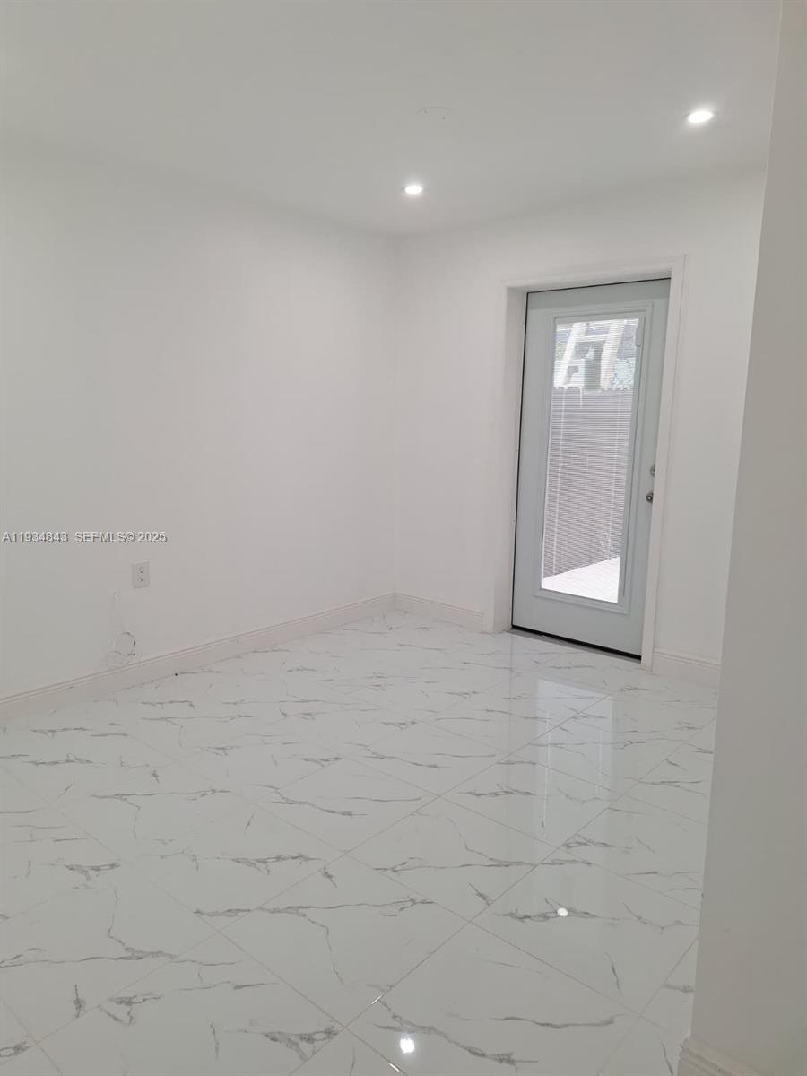 14402 Southwest 111th Street, Unit 14402 Miami, FL 33186 - Photo 14 of 21 a view of empty room